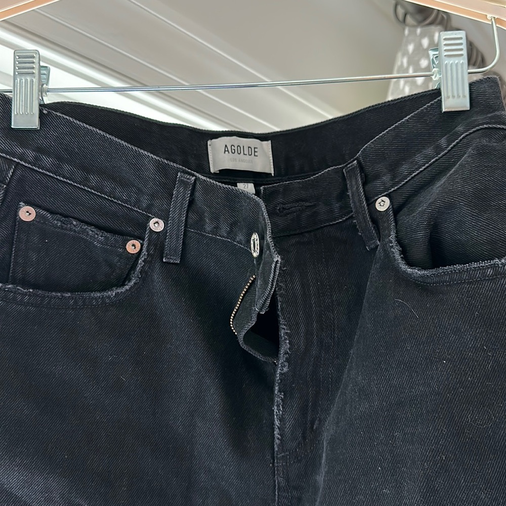 Women’s black AGOLDE denim jeans.